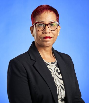 Robin Tucker , JP, MP